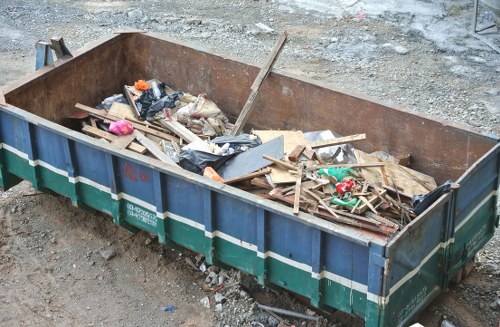 Construction site with waste being cleared in Rotherhithe
